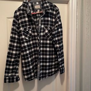 100% Cotton flannel shirt. Black and white.